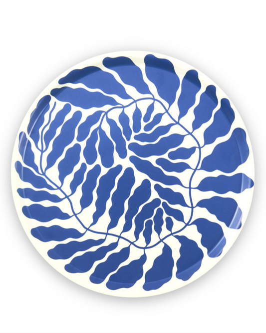 This eye-catching circular tray features Swedish artist Linnéa Andersson’s signature leafy motifs, spiralling out across its surface and finished in a striking blue hue.