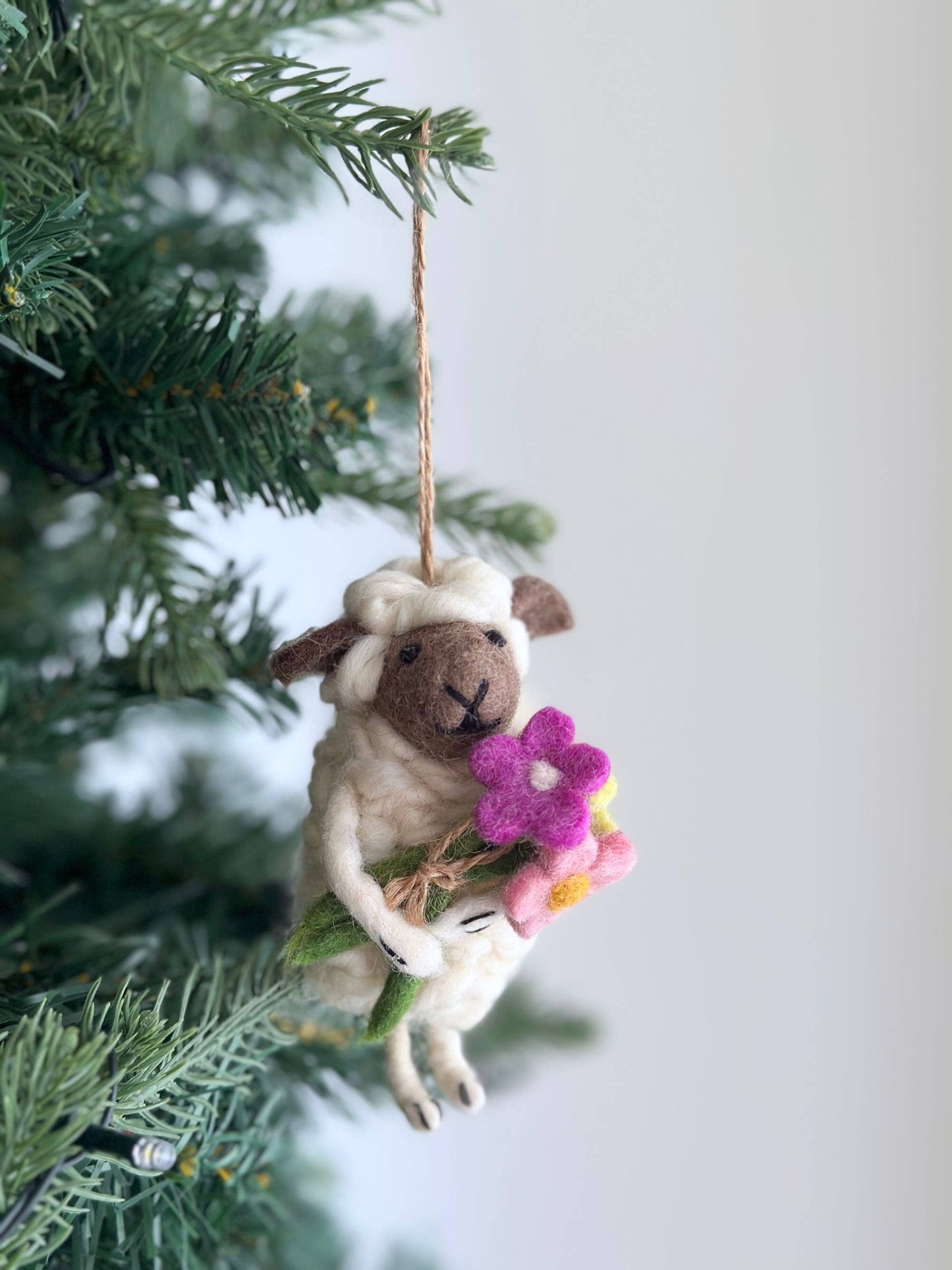 Sheep Holding Santa Ornament