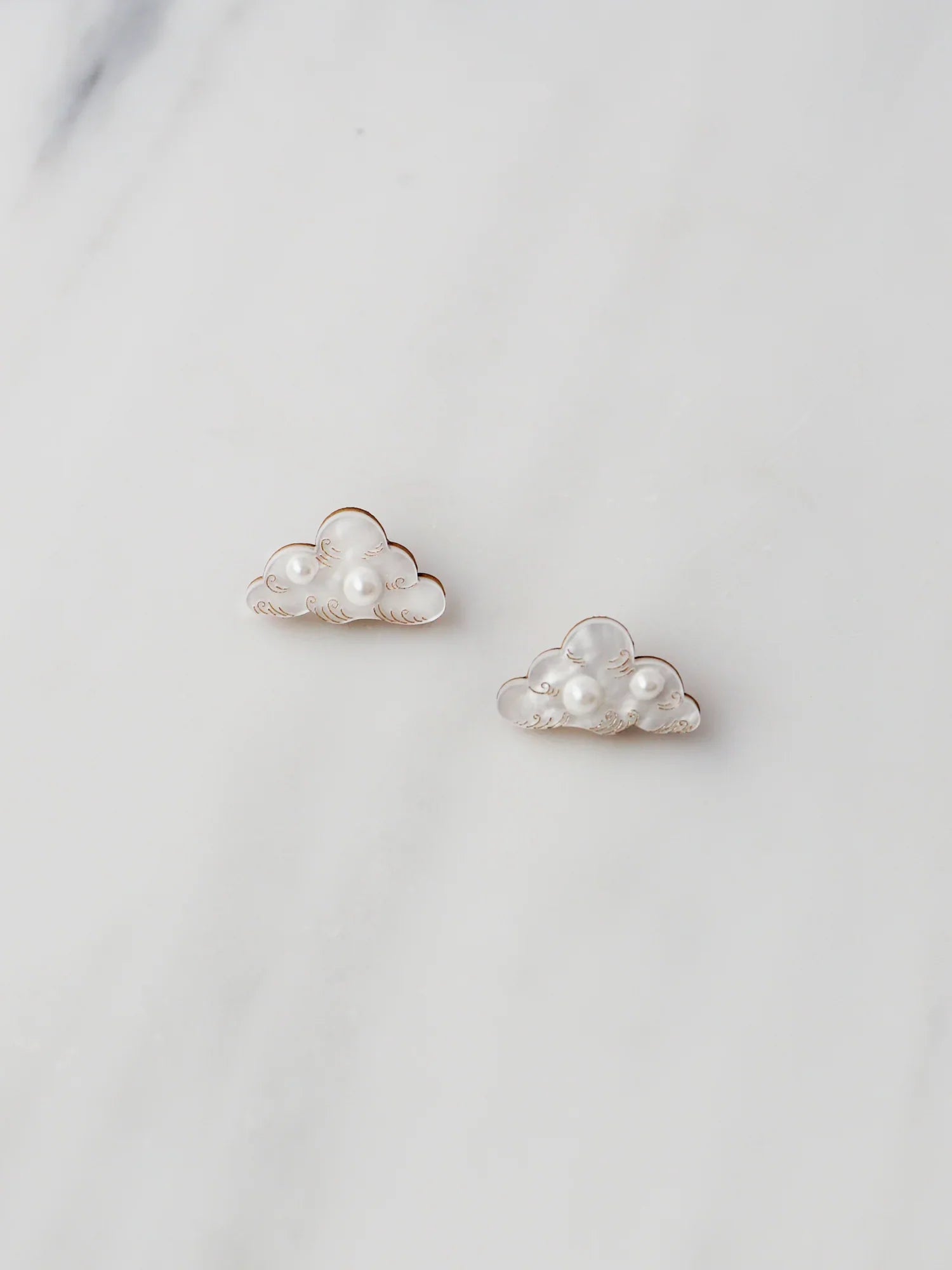 The Every Space Cloud stud earrings in sterling silver and acrylic by Wolf & Moon