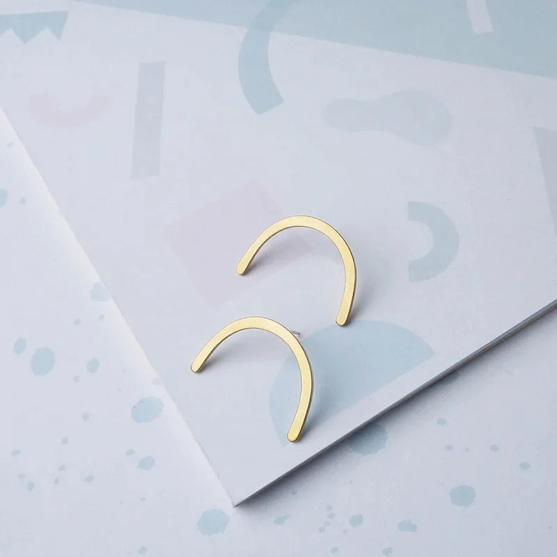 The Every Space gold plated Curve earrings by Custom Made UK