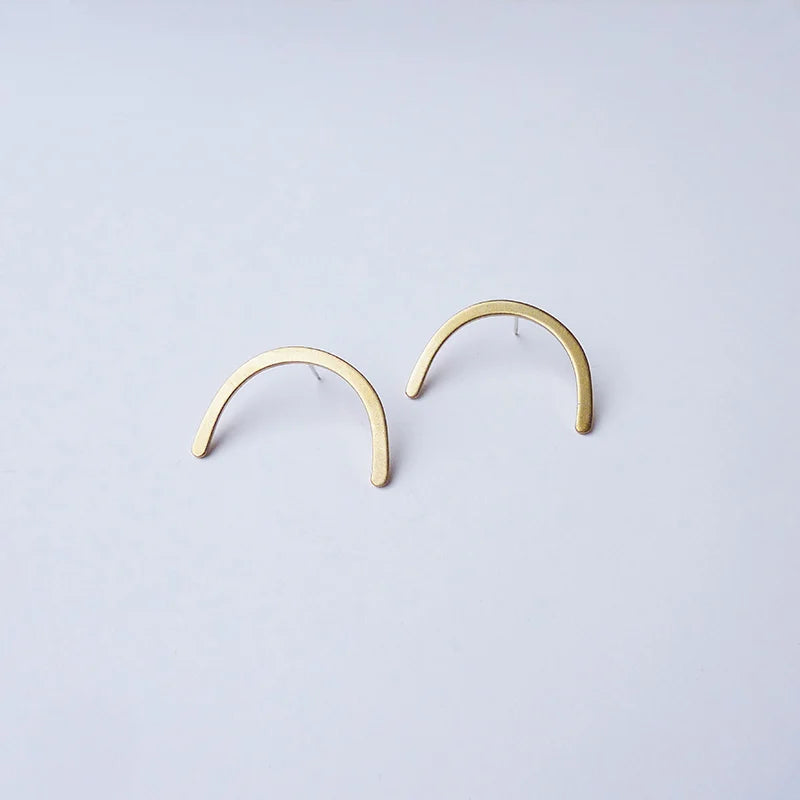 The Every Space gold plated Curve earrings by Custom Made UK